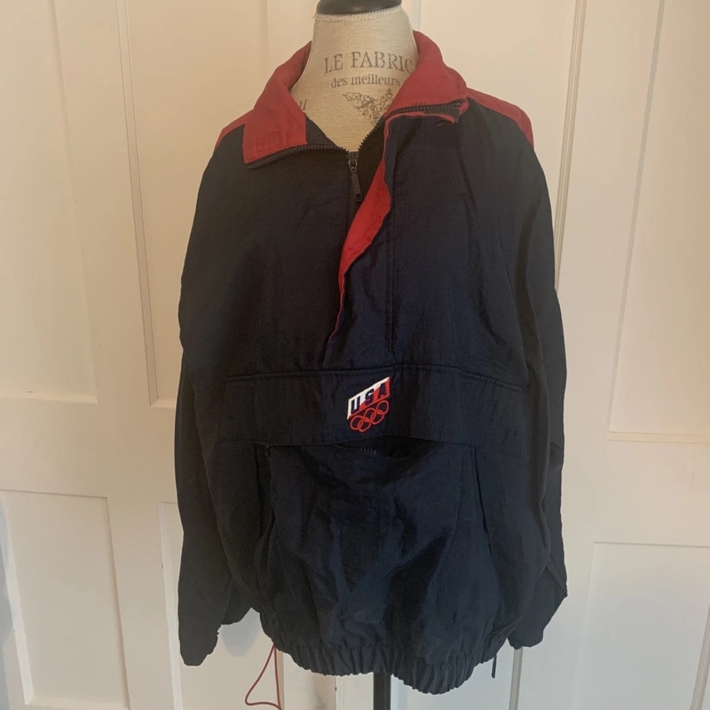 USA Olympic pullover jacket, red and navy blue size large emblem on the front